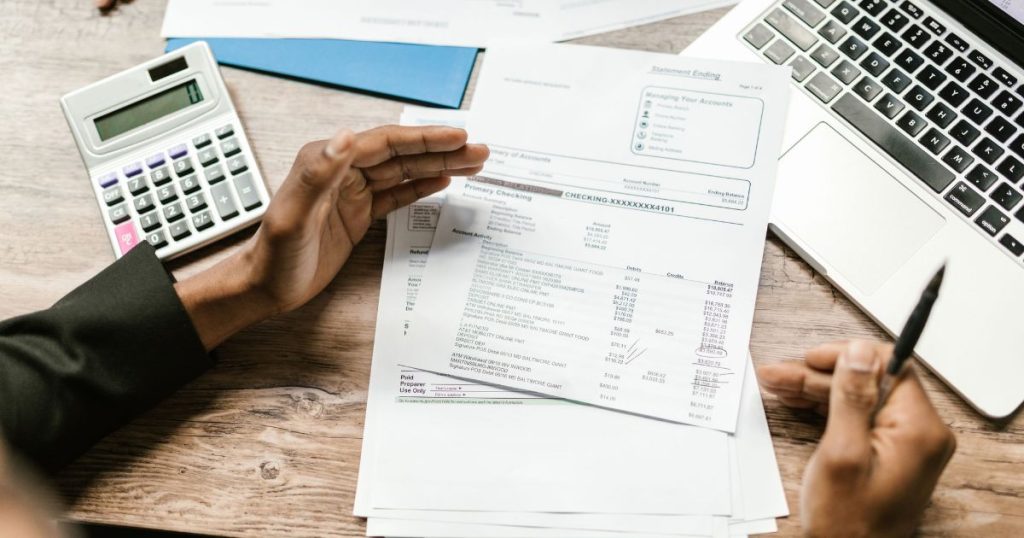 Business owner reviewing different business funding options and financing solutions